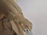 a paper mache of a hand holding something