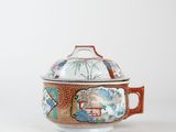 an image of a bowl with a lid on a white surface