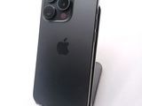an apple iphone is sitting on top of a stand on a white surface
