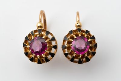 an image of a pair of earrings with a pink stone