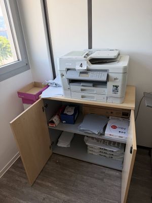 a printer that is sitting on top of a desk
