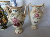 three vases sitting next to each other on a table