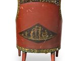 an image of a red chair with a gold and black design