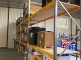 a large warehouse with a lot of boxes and boxes on the shelves
