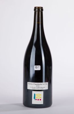 a bottle of wine that is sitting on a table