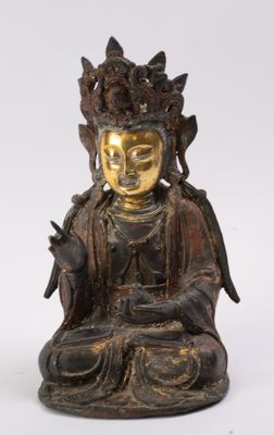une image représentant une statue de Bouddha assis sur une surface blanche