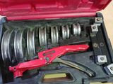 a tool in a case that is sitting on a table