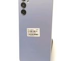 an image of a close up of a cell phone with a sticker on it