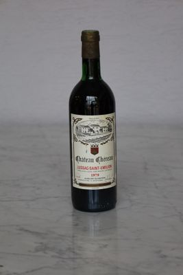 a bottle of wine that is sitting on a table