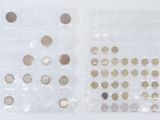 a lot of coins in a plastic bag on the table
