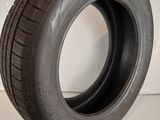 a close up of a tire on a white surface with a white background