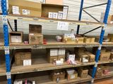 many boxes and boxes on the shelves in the warehouse