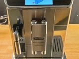 a coffee machine that is sitting on a wooden table
