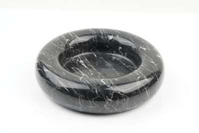 black marble ashtray on white background with white background
