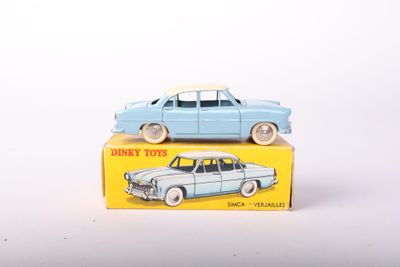 a small toy car sitting on top of a box