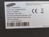 a close up of a cell phone with a sticker on it