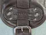 a brown and blue bag with a buckle on it