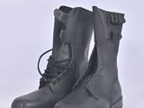 pair of black leather boots with laces and buckles on them