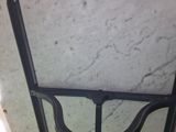 a glass door with a metal handle on it