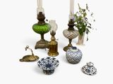 many different types of vases and vases on the table