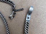 a rope with a metal hook attached to it