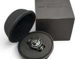 an image of a black box with a watch inside of it