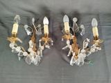 pair of crystal and brass sconces with flowers and leaves
