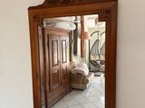 a mirror hanging on the wall in a room