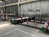 a large warehouse with a lot of steel pipes