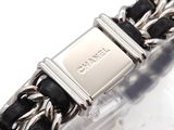 a black and silver bracelet with a silver clasp