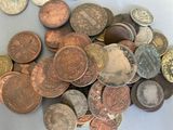 a pile of coins sitting on top of a table