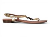 a close up of a woman ' s sandals on a white background