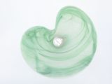 a green heart shaped object with a diamond in it