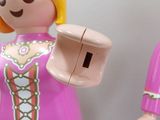 two toy figures of a woman and a man