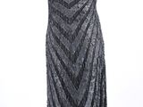 a black and silver dress on a mannequin mannequin mannequin mannequin mannequin mannequin mannequin mannequin mann