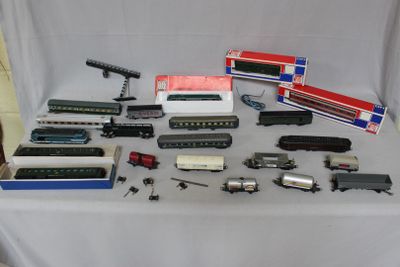 many different types of toy trains on a table