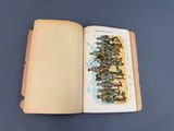 an open book with a picture of a group of people on it