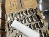 a cardboard box with a roll of toilet paper and a roll of toilet paper in it