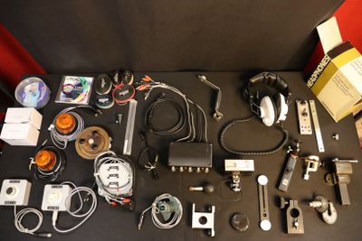 a table with a bunch of electronics on it