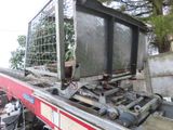 an image of a truck with a cage on the back of it