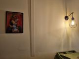 a picture of a lamp that is on the wall