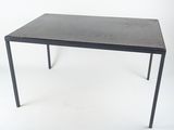 a black table with a black top on a white background