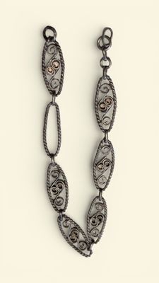 Bracelet en argent partiellement vermeillé à décor de maille…