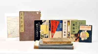 a lot of books that are sitting on a table