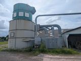 a large machine that is sitting outside of a building
