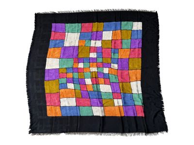 an image of a multicolored patchwork scarf on a white background