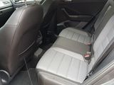 the back seats of a car with a seat belt in a car