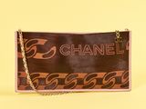 Pochette Chanel marron et rose avec bandoulière en chaîne