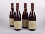 three bottles of wine sitting next to each other on a table