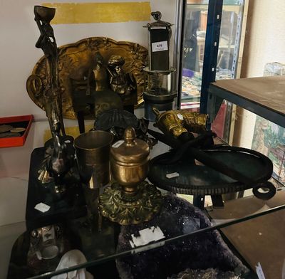 a glass table with a lot of items on top of it